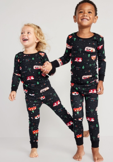 Toddler girl and boy wearing unisex snug-fit printed pajama set.