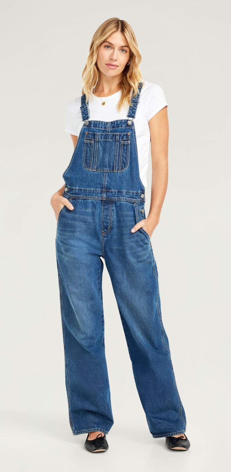 A pair of dark wash overalls with a comfy fit.