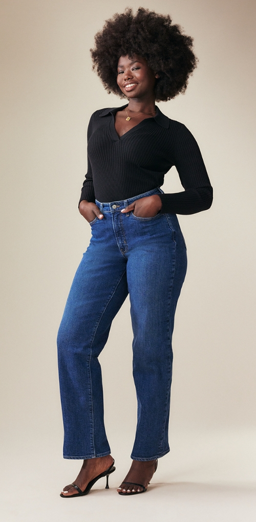 A pair of extra high waisted dark washed curvy OG loose jeans.