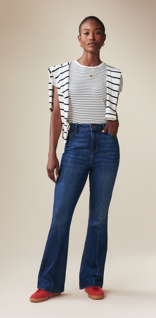 A pair of extra high waisted dark washed flare jeans.