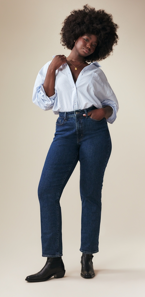 A pair of high waisted and dark washed curvy straight jeans.