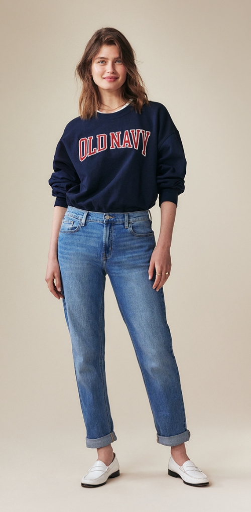 A pair of mid-rise medium washed wow boyfriend jeans.