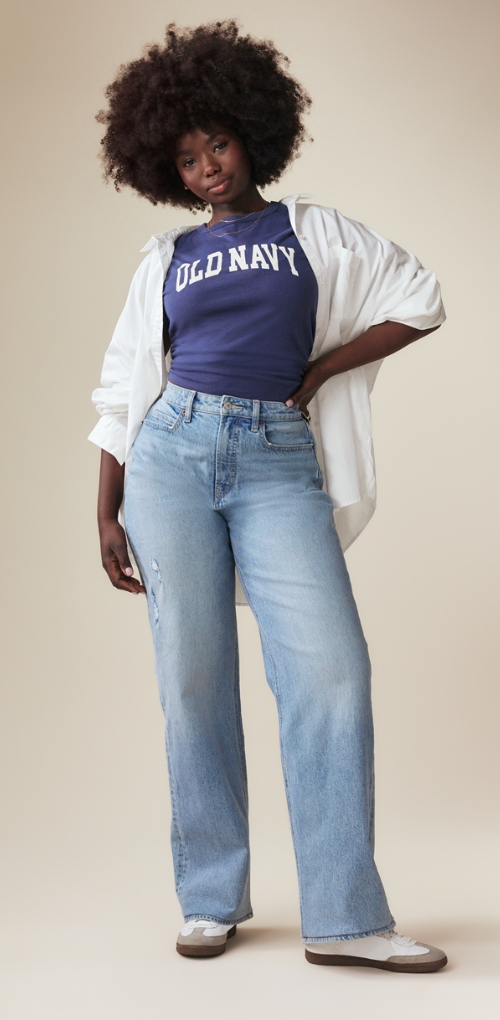 A pair of extra high-rise light washed curvy wide leg jeans.