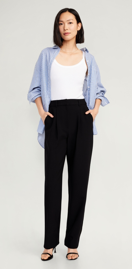 Female model wearing high waisted Billie straight trouser.