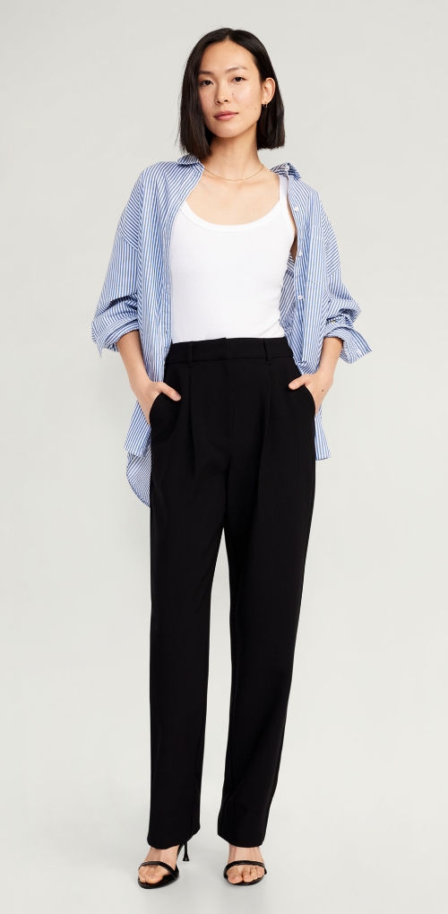 Female model wearing high waisted Taylor trouser straight pants.