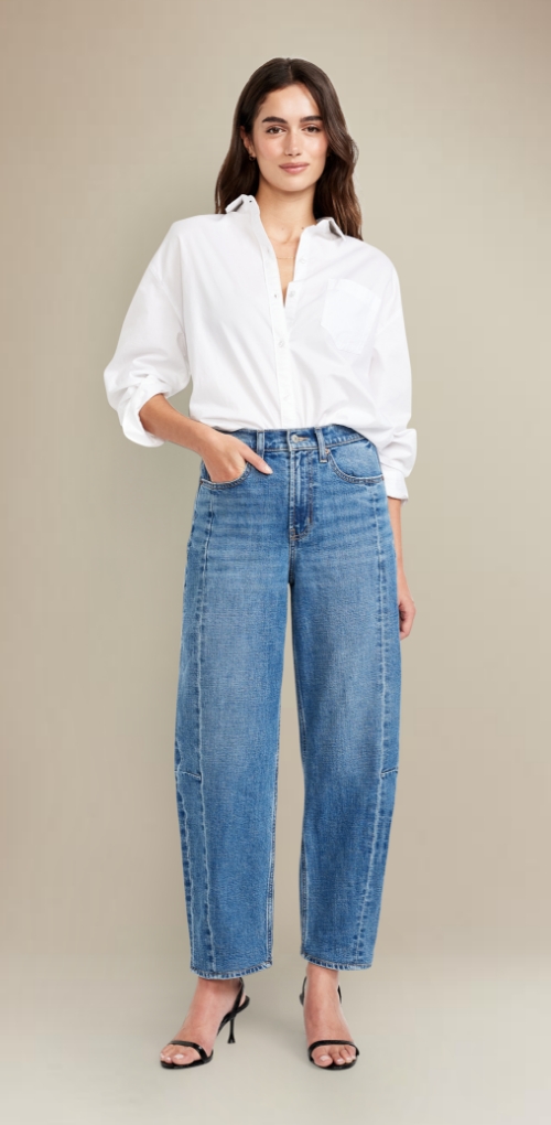 A pair of high waisted light washed barrel leg jeans.